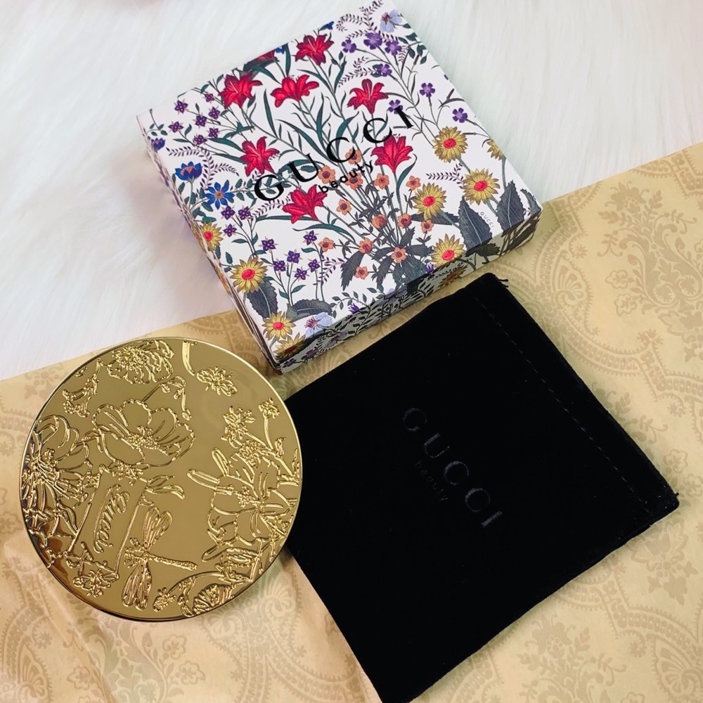 Gucci GWP gold compact mirror